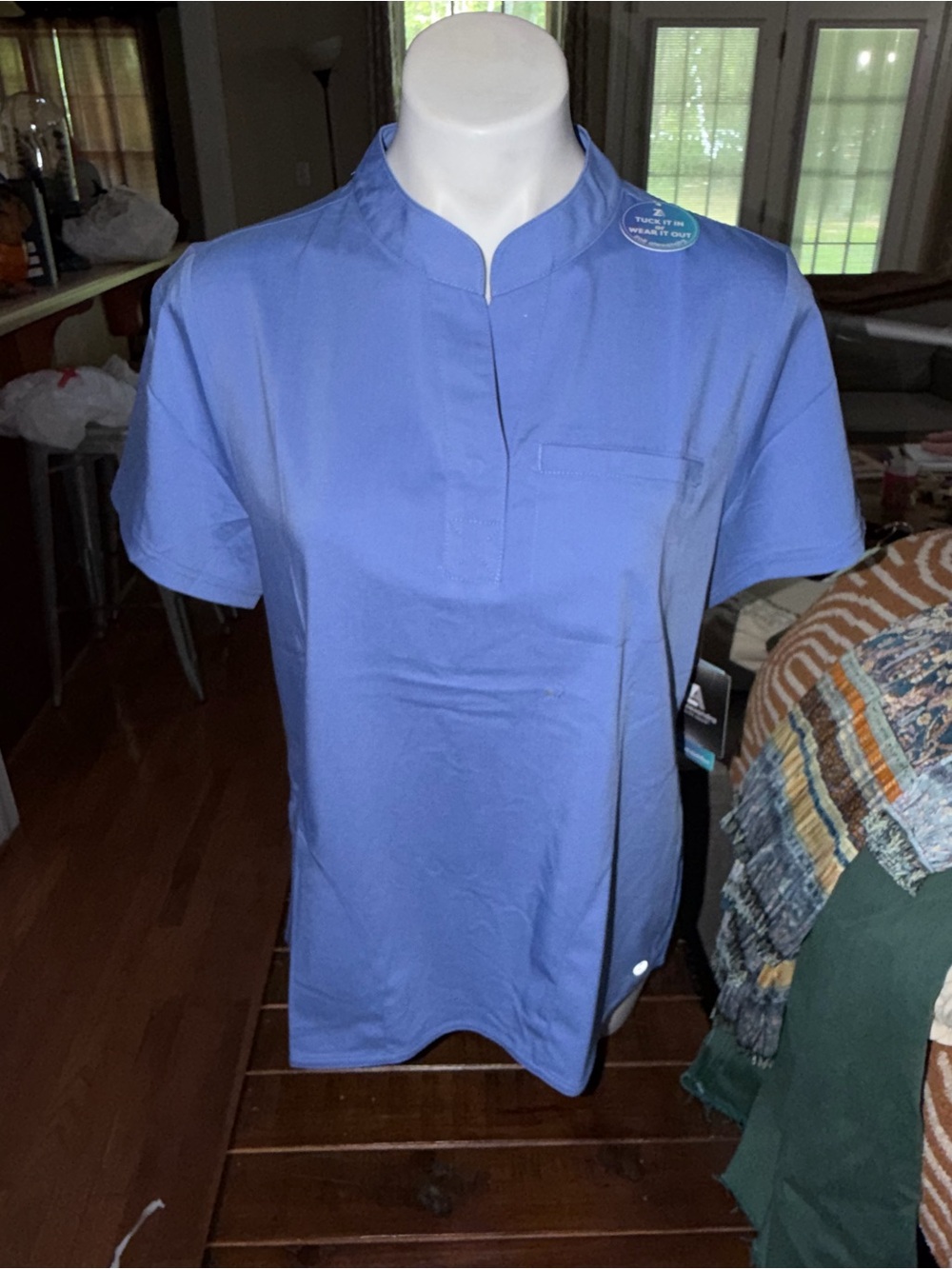 Women’s scrub top. NWT. Size medium